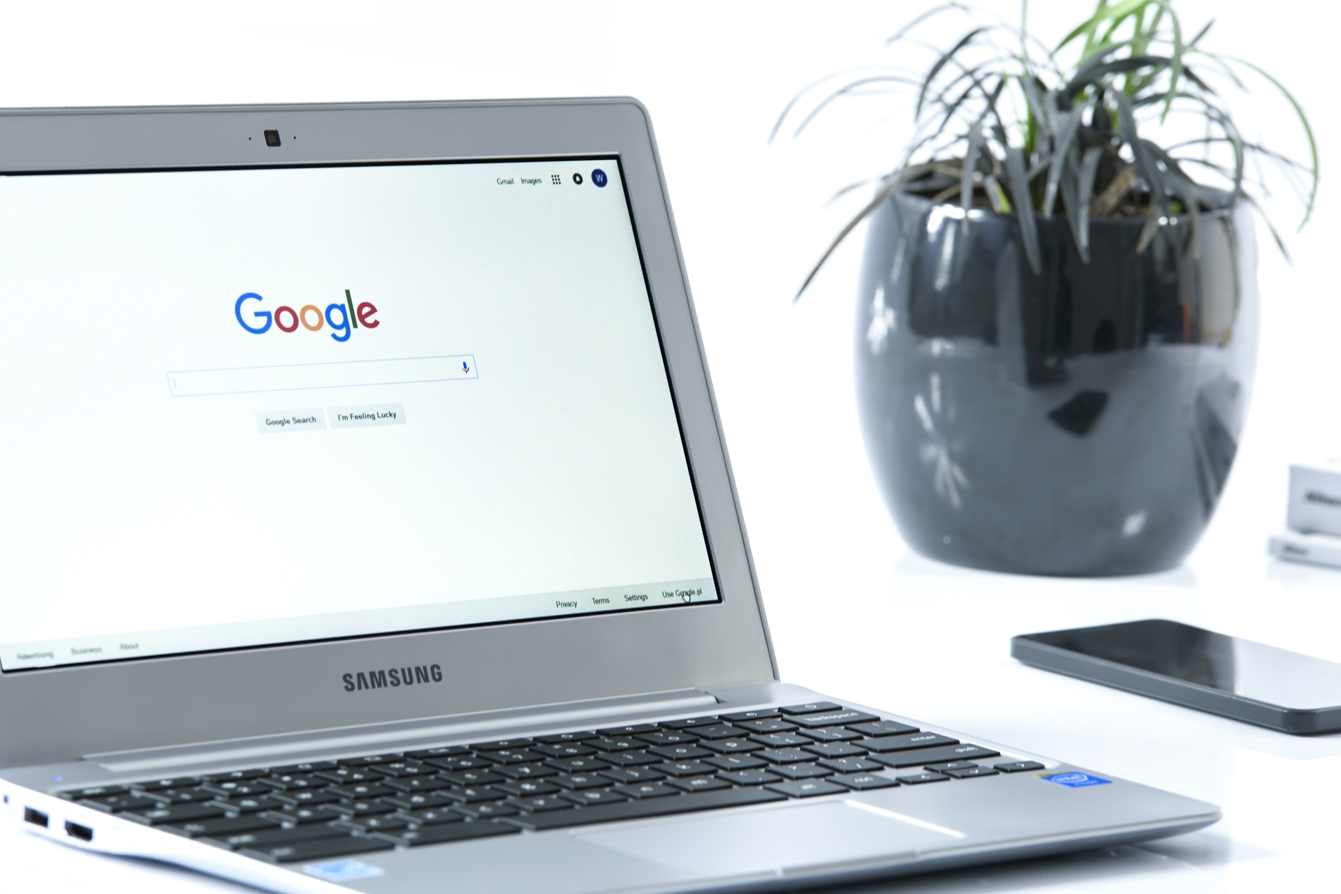 Silver Laptop and phone
